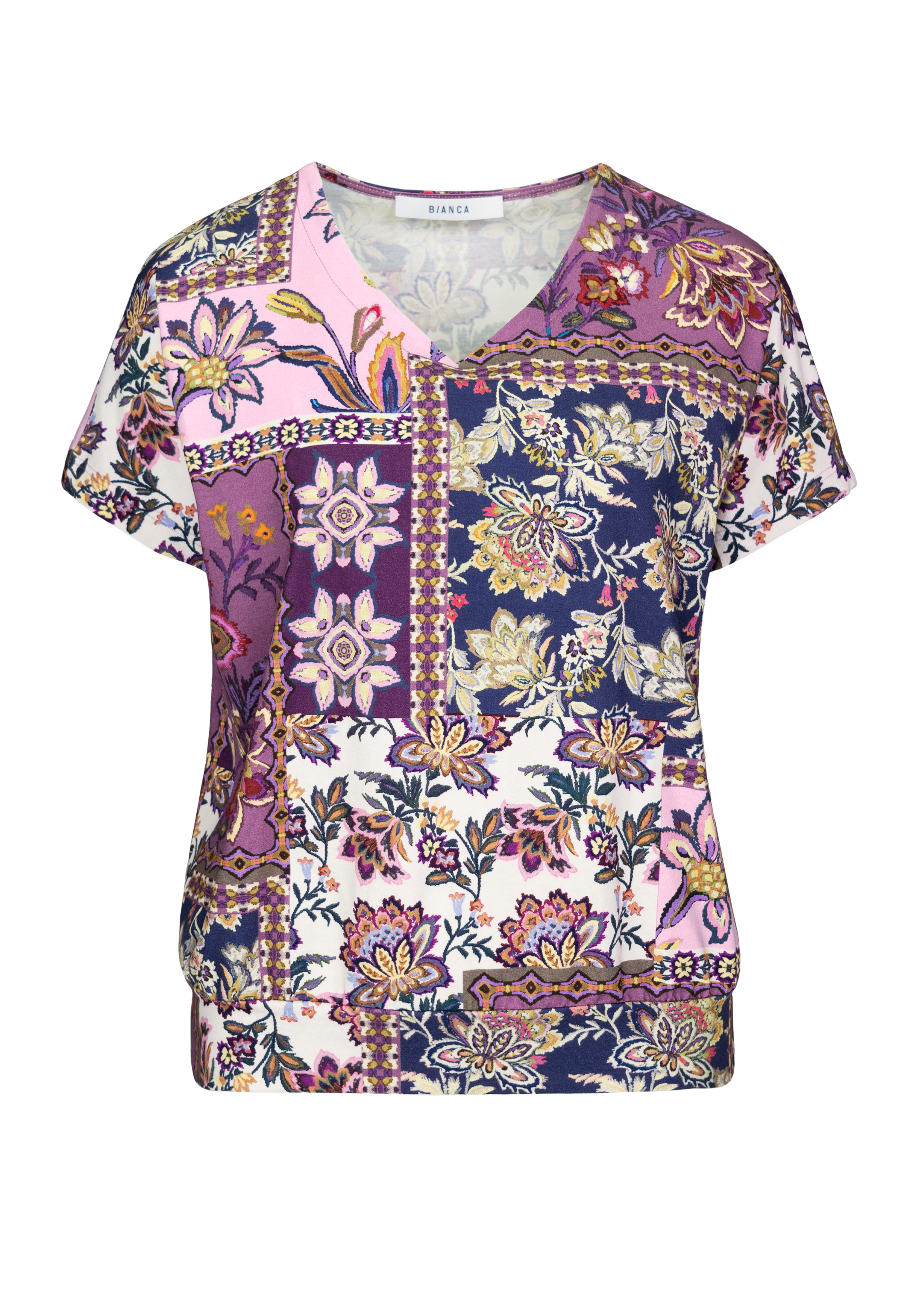 Kurzärmelige Damenbluse mit V-Ausschnitt und farbenfrohem Patchwork-Blumenmuster in Lila-, Rosa-, Marineblau- und Gelbtönen. Der Stoff weist verschiedene komplizierte florale und botanische Muster auf.
