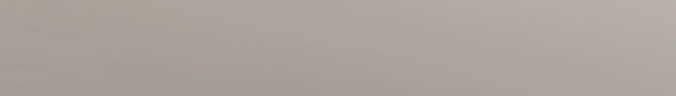 Eine schlichte Oberfläche in einem einheitlichen hellen Beige- oder Taupeton ohne sichtbare Muster oder Objekte.
