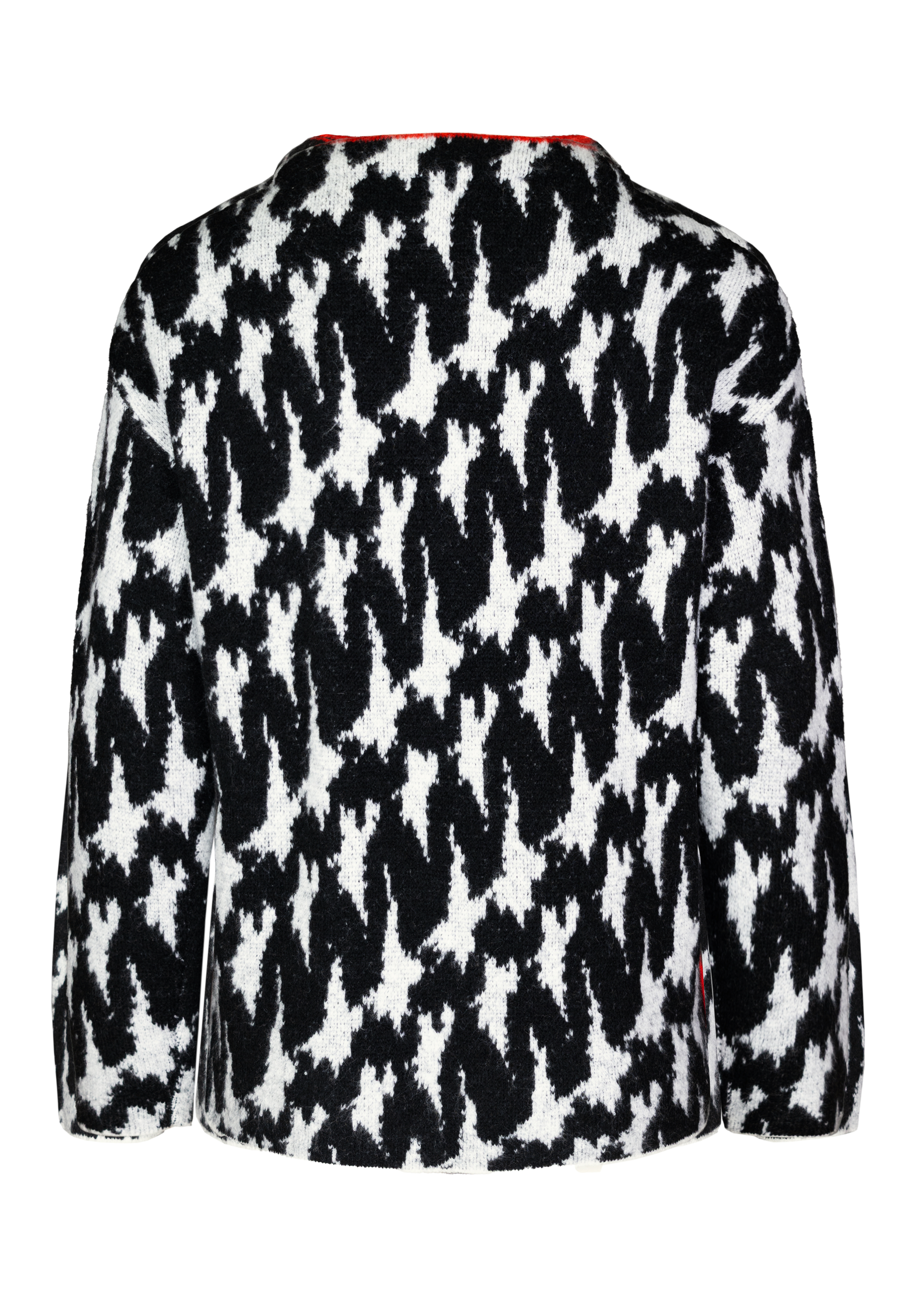 Ein langärmeliger Pullover mit einem abstrakten schwarz-weißen Muster, hier von hinten gesehen. Das Design besticht durch unregelmäßige, gezackte Formen, die einen markanten, kontrastreichen Look erzeugen.